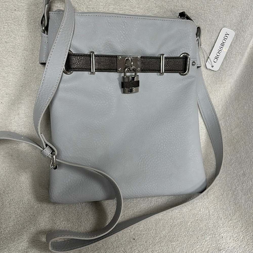 Beautiful NWT Crossbody Brand, light Gray Purse, crossbody strap, silver trims